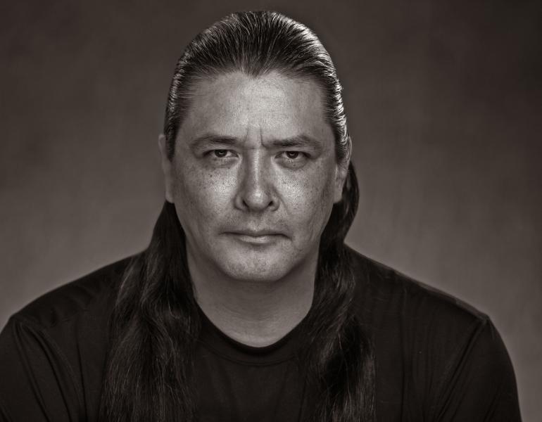 Jeremy in black and white, a headshot