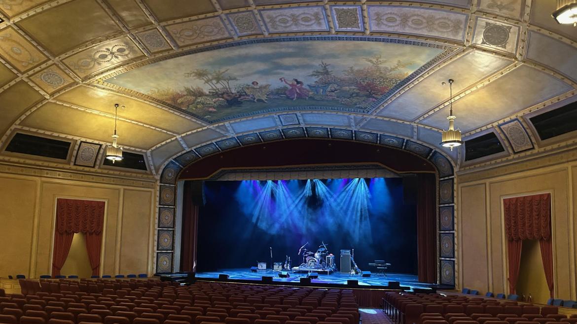The Sanderson Theatre space, a beautiful old theatre with a victorian style mural on the roof.