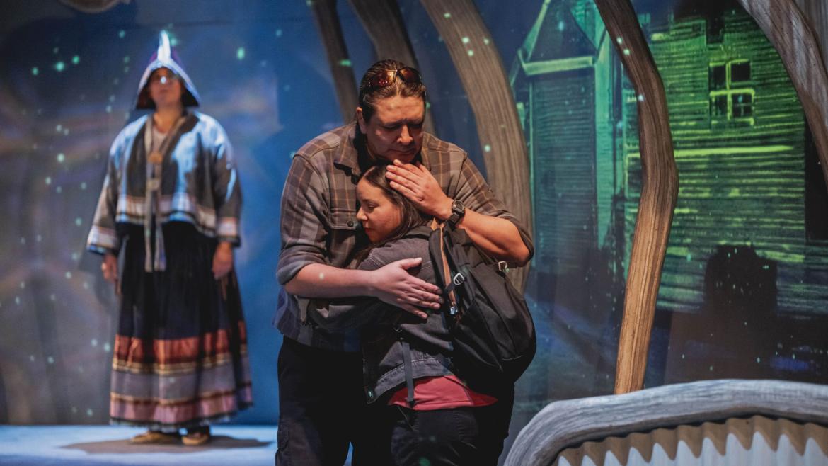 A scene for Mischief where one character hugs another